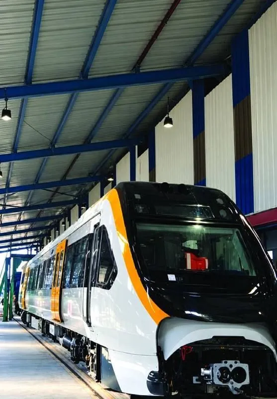 A metro rail coach inside the Bombardier Transportation shed at Manjusar