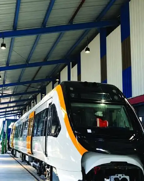 A metro rail coach inside the Bombardier Transportation shed at Manjusar