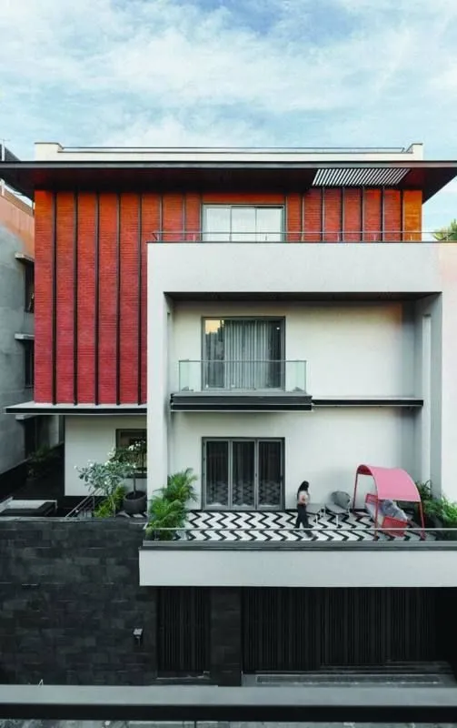 Terracotta and white residence front elevation