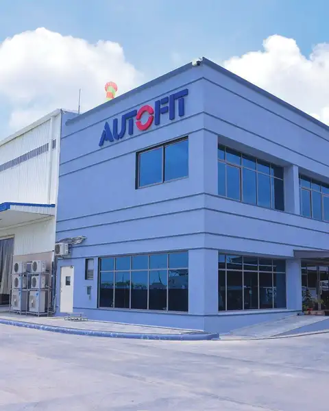Autofit Pvt. Ltd. factory in Halol GIDC with a glazed two-storey administration block