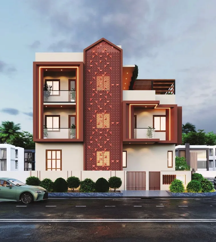 Three-storey residence with a terracotta brick jaali tower and white balconies